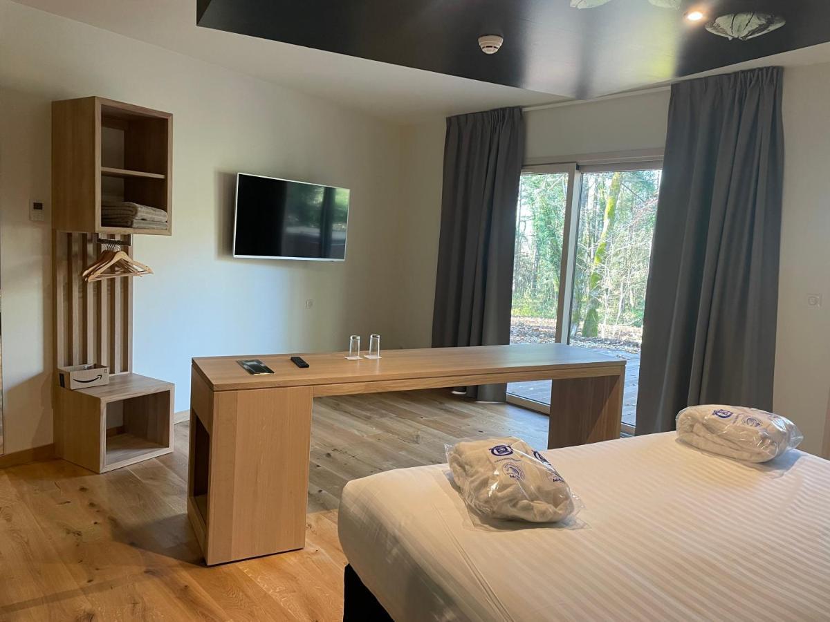 Le Bois Dormant-Hotel Restaurant & Spa Logis Hotel ชอมปาญโญล ภายนอก รูปภาพ